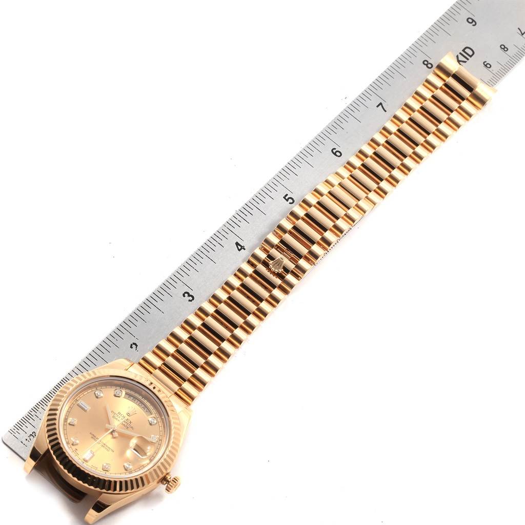 The image shows a Rolex President 218238 Men's Yellow Gold Champagne Dial 218238 Men's Yellow Gold Champagne Dial watch laid flat, with the band and face visible near a ruler for scale.