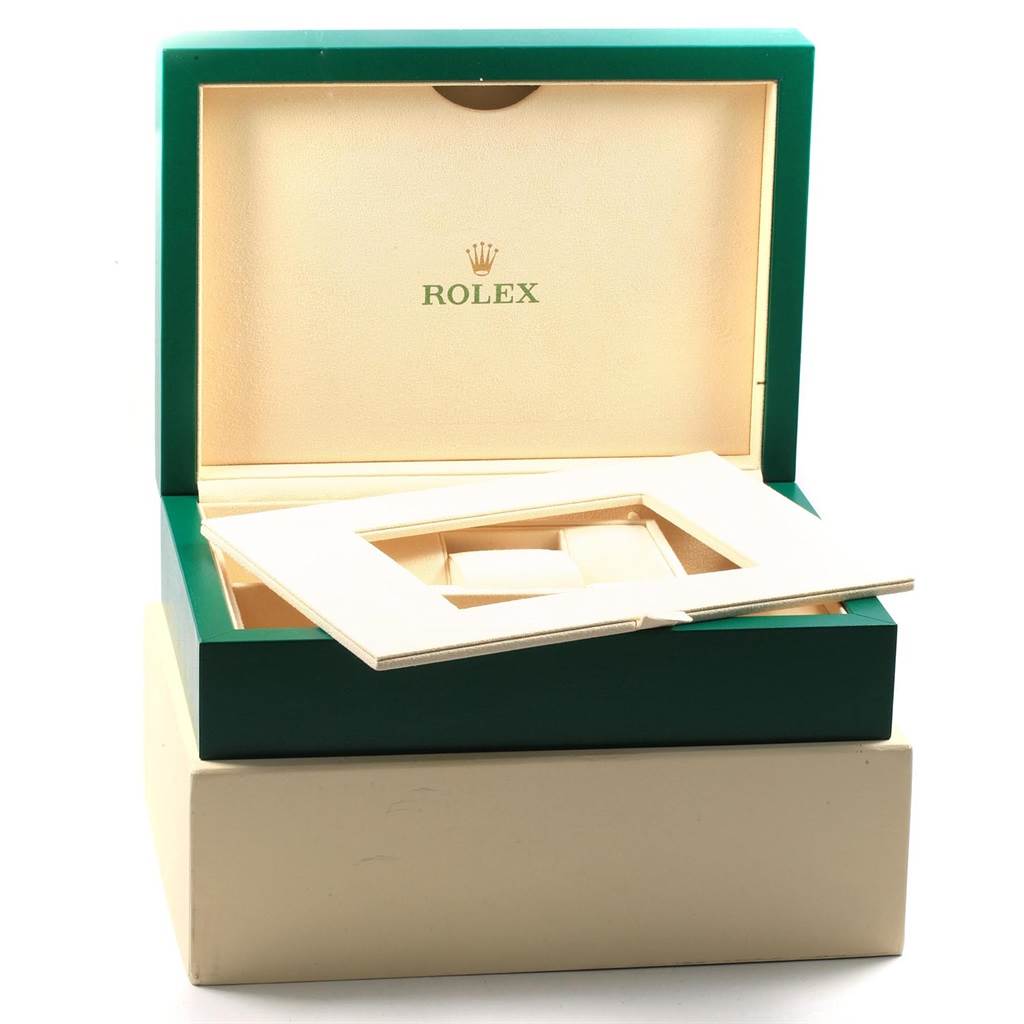 This image shows the open box for a Rolex President 218238 Men's Yellow Gold Champagne Dial 218238 Men's Yellow Gold Champagne Dial model watch, displaying the interior and packaging.