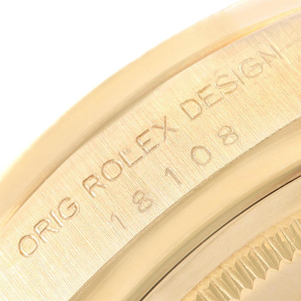 This close-up image shows the engraved model number and branding on the case of the Rolex President 18108 Men
s Yellow Gold Champagne Dial 18108 Men
s Yellow Gold Champagne Dial watch.