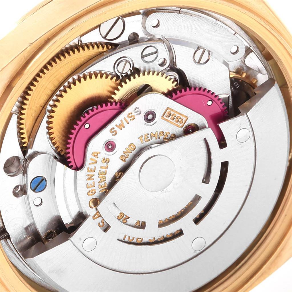 The image shows a close-up of the movement mechanism inside a Rolex President 1803 Men
s Yellow Gold Champagne Dial 1803 Men
s Yellow Gold Champagne Dial model watch.
