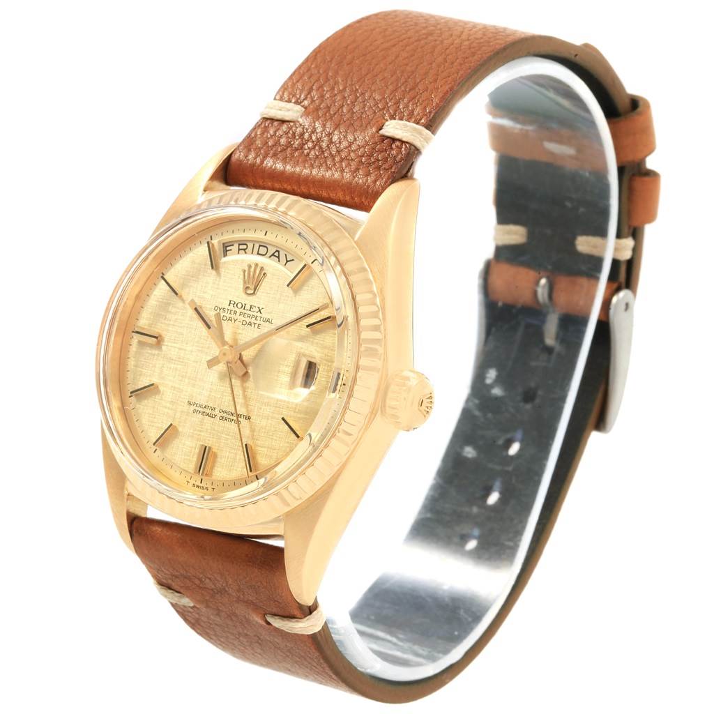 This Rolex President 1803 Men
s Yellow Gold Champagne Dial 1803 Men
s Yellow Gold Champagne Dial model watch is shown at an oblique angle, displaying the dial, bezel, crown, and brown leather strap.