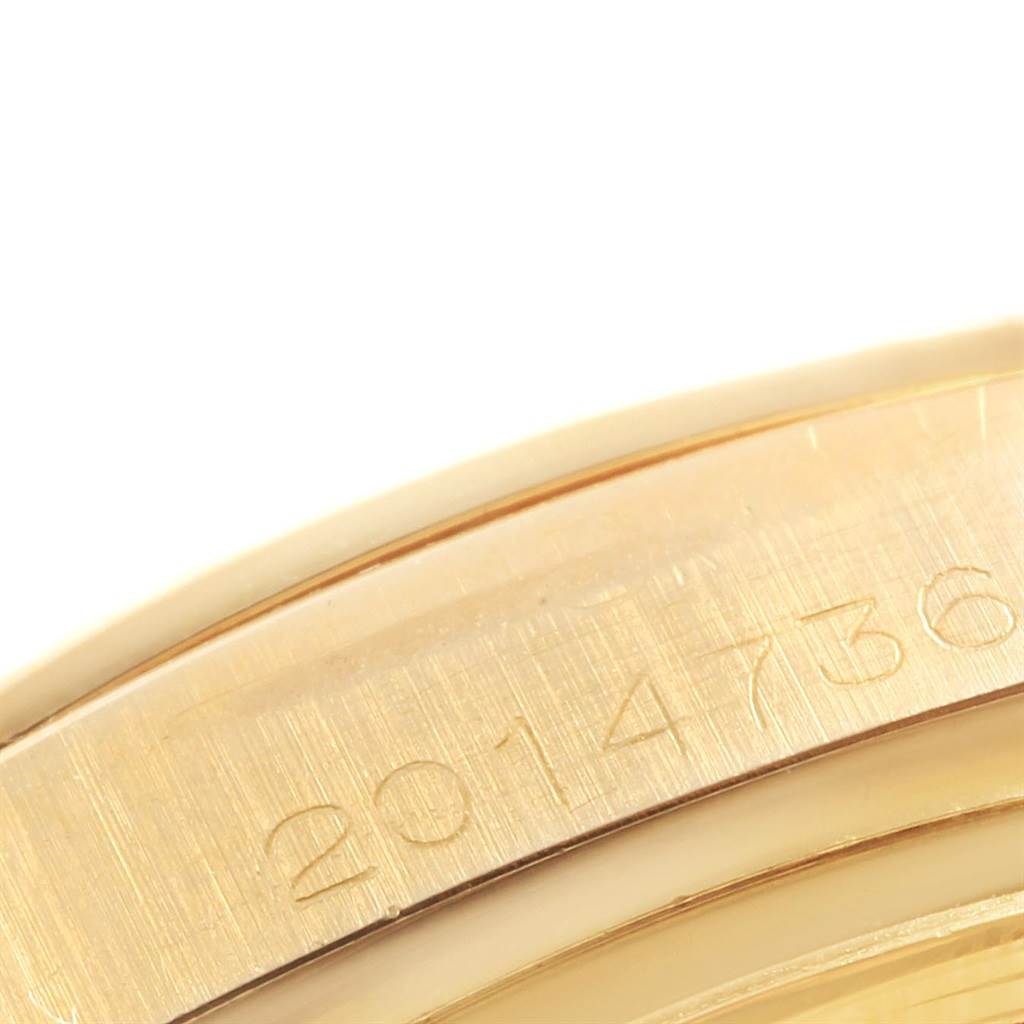 This image shows a close-up of the serial number engraved on the side of a Rolex President 1803 Men
s Yellow Gold Champagne Dial 1803 Men
s Yellow Gold Champagne Dial watch case.