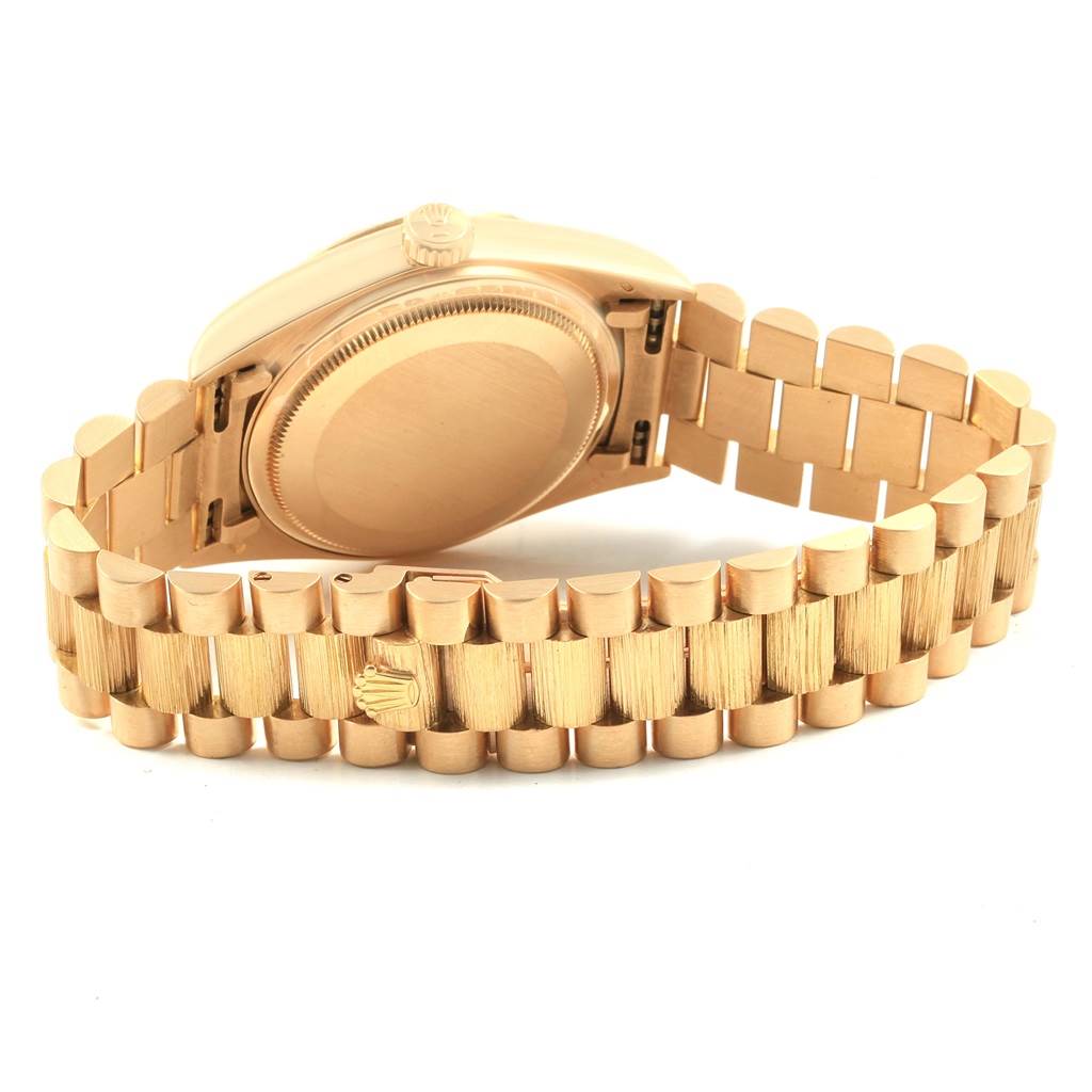 The image shows the back case and bracelet of a Rolex President 18078 Men
s Yellow Gold Champagne Dial 18078 Men
s Yellow Gold Champagne Dial model watch, viewed from an oblique rear angle.