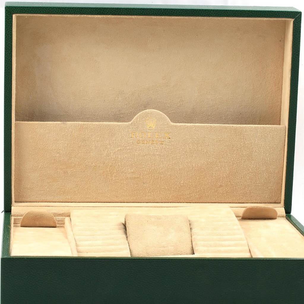 This image shows an empty Rolex President 18238 Men
s Yellow Gold Champagne Dial 18238 Men
s Yellow Gold Champagne Dial model watch box, displaying its interior compartments and padding.