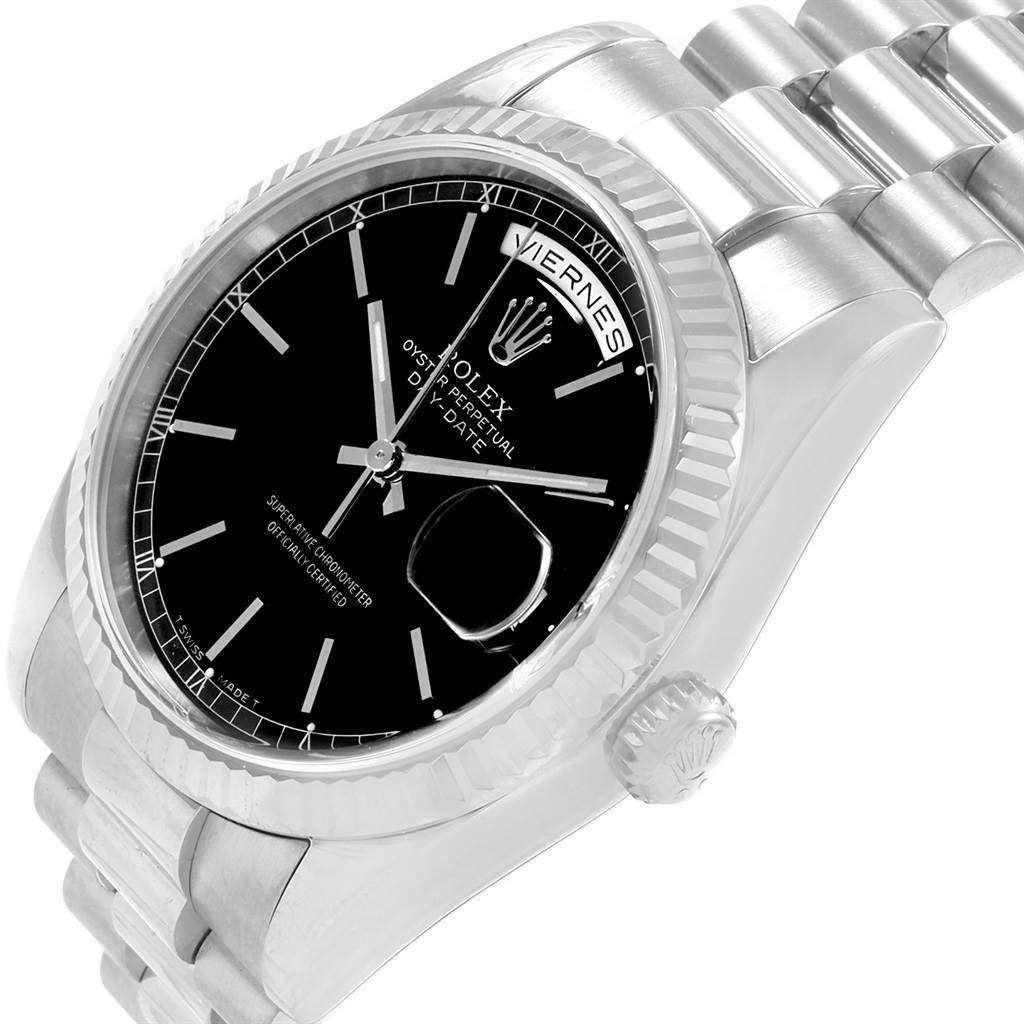 The image shows a close-up of a Rolex President 118239 Men's White Gold Black Dial 118239 Men's White Gold Black Dial model watch, featuring its bezel, black dial, bracelet, and crown.