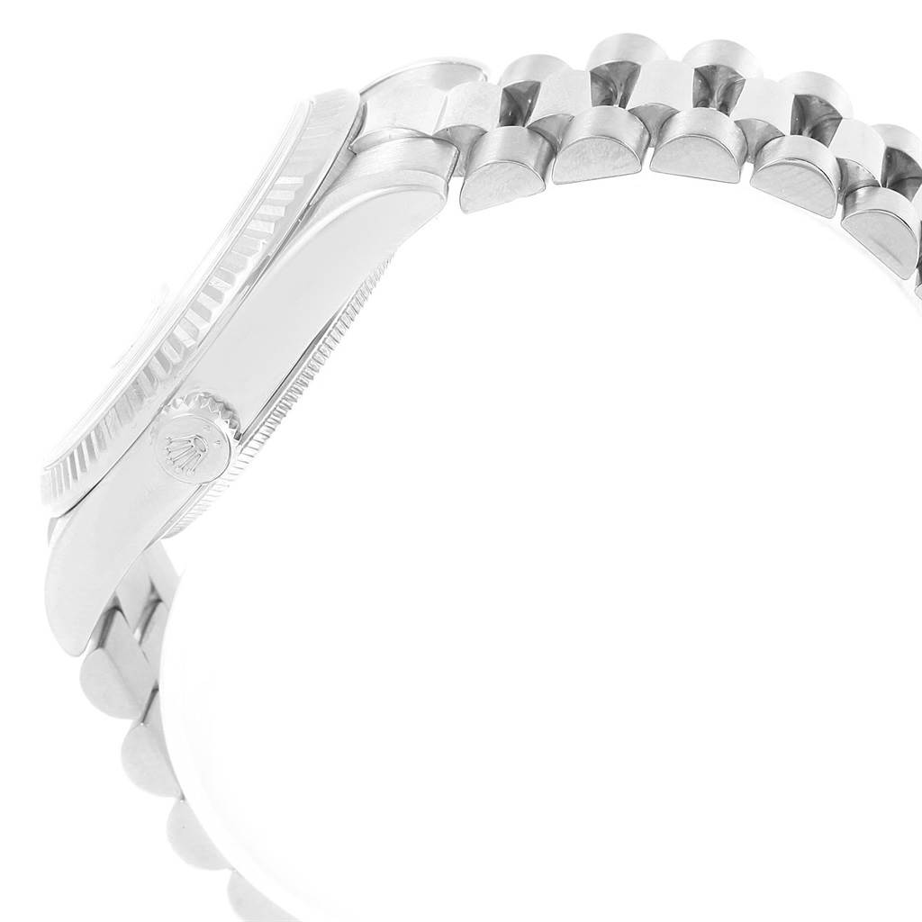 This image shows a side view of a Rolex President 118239 Men's White Gold Black Dial 118239 Men's White Gold Black Dial watch, highlighting the crown and part of the bracelet.