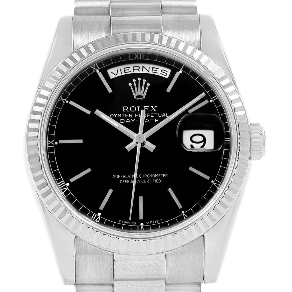 The image shows a front view of a Rolex President 118239 Men's White Gold Black Dial 118239 Men's White Gold Black Dial model watch, highlighting its black dial, fluted bezel, and cyclops date window.