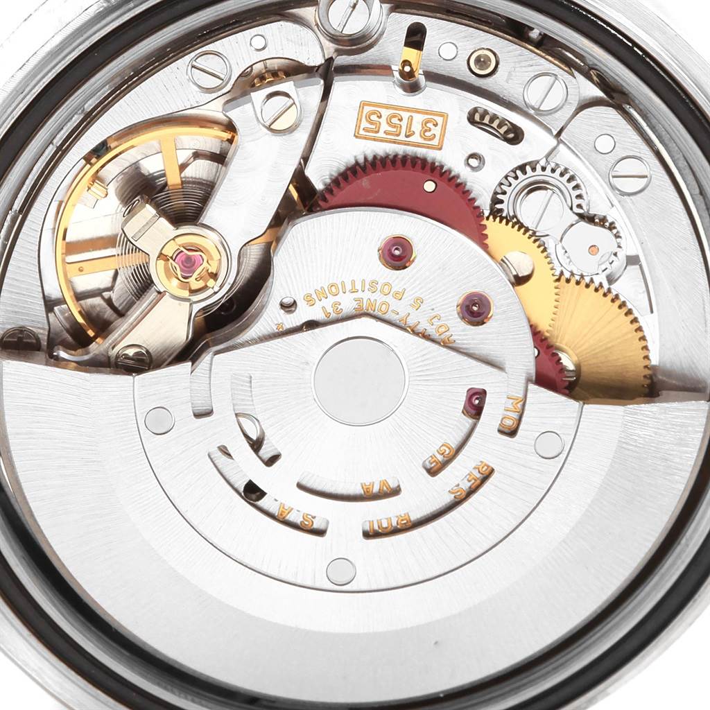 The image shows an internal view of the Rolex President 118239 Men's White Gold Black Dial 118239 Men's White Gold Black Dial model watch movement, highlighting gears and mechanical components.