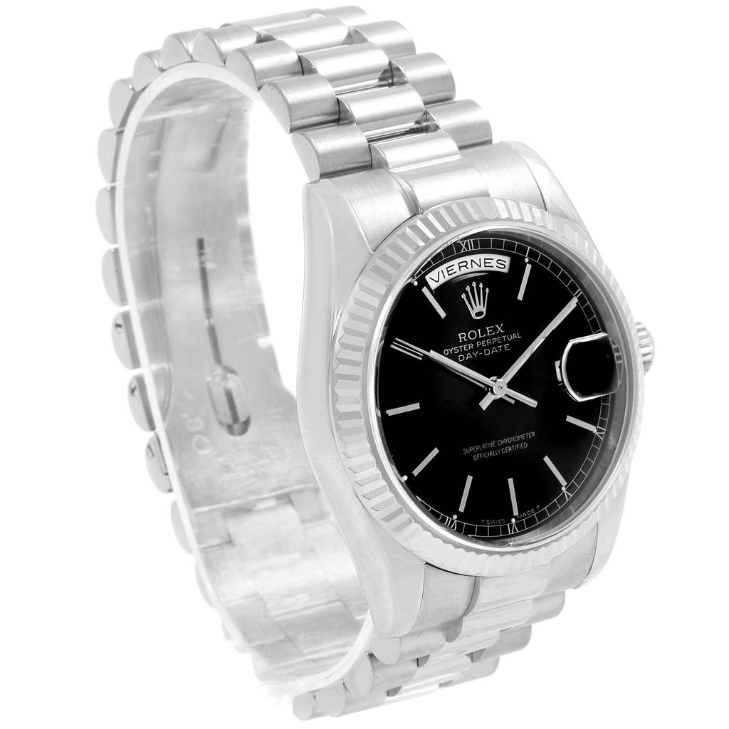 The image shows a Rolex President 118239 Men's White Gold Black Dial 118239 Men's White Gold Black Dial model watch from an angle highlighting its bracelet, bezel, and face with the day and date displayed.