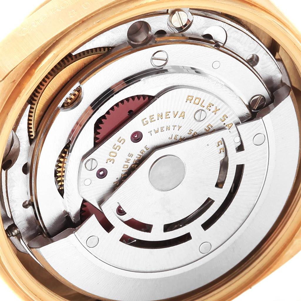 The image shows a close-up view of the internal movement mechanism of a Rolex President 18038 Men
s Yellow Gold Silver Dial 18038 Men
s Yellow Gold Silver Dial model watch.