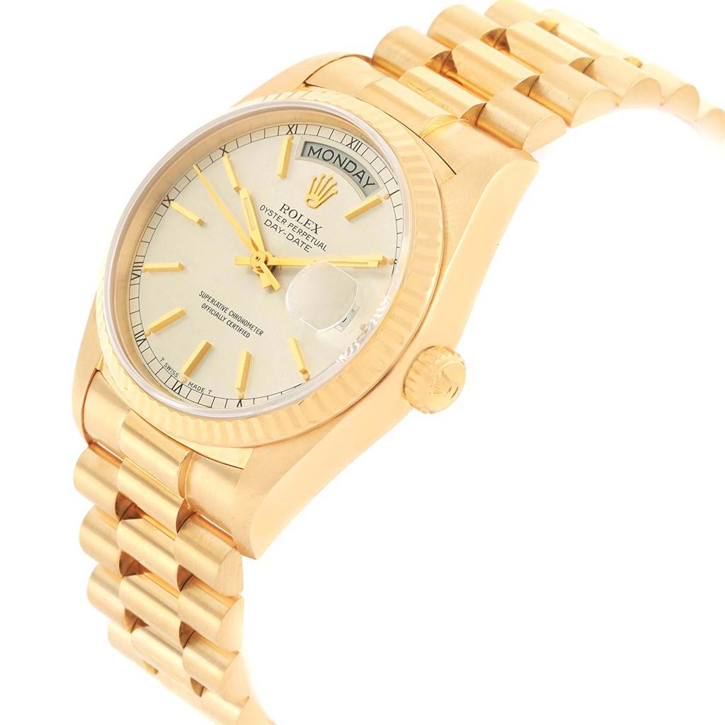 The image shows a Rolex President 18038 Men
s Yellow Gold Silver Dial 18038 Men
s Yellow Gold Silver Dial model watch from an angled top-down view, highlighting the face, bezel, and part of the bracelet.