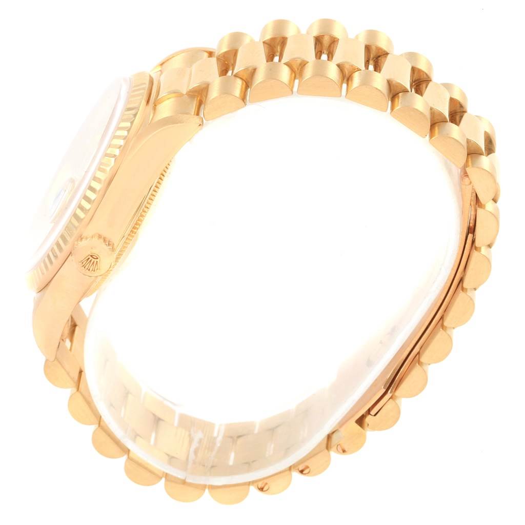 The image shows a side angle of the Rolex President 16238 Men
s Yellow Gold Champagne Dial 16238 Men
s Yellow Gold Champagne Dial model, highlighting the watch
s gold case and bracelet.