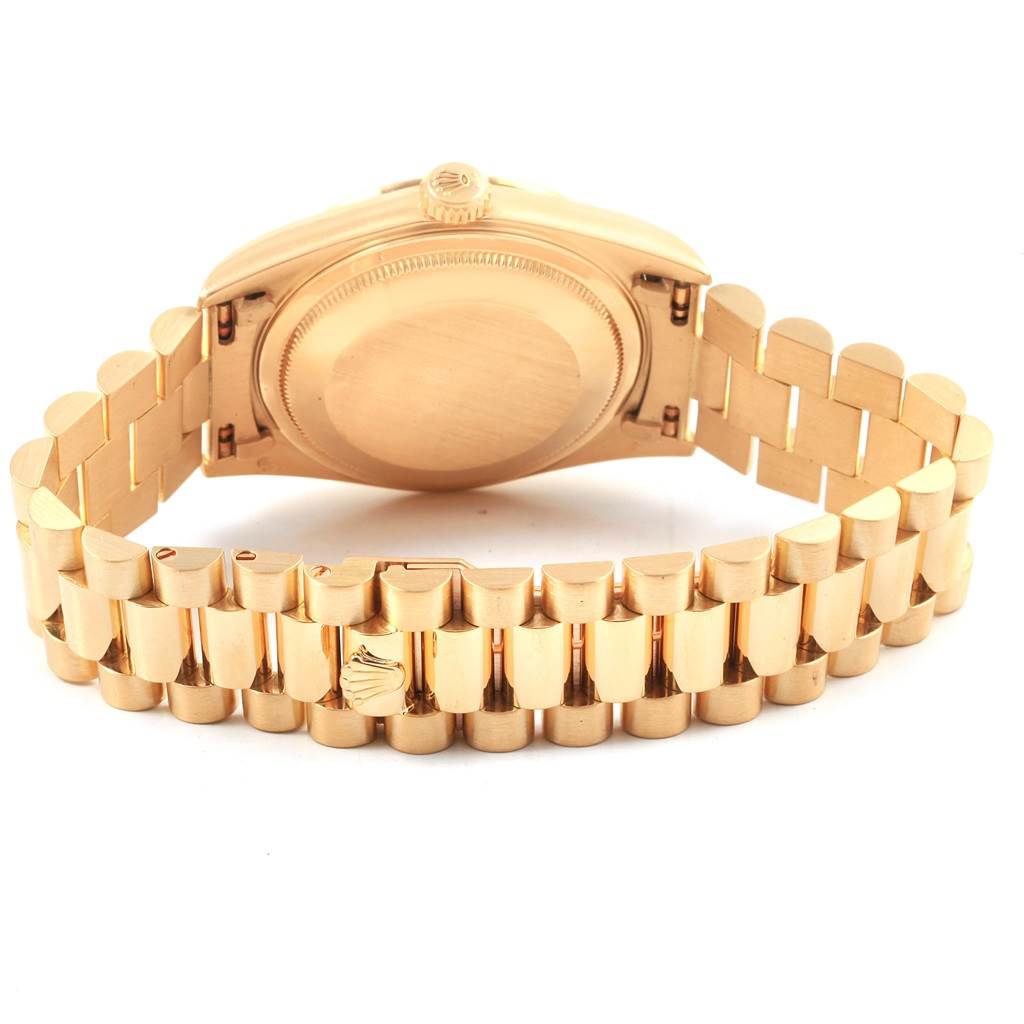 The image shows the back view of a Rolex President 16238 Men
s Yellow Gold Champagne Dial 16238 Men
s Yellow Gold Champagne Dial model watch, highlighting the case back and bracelet.