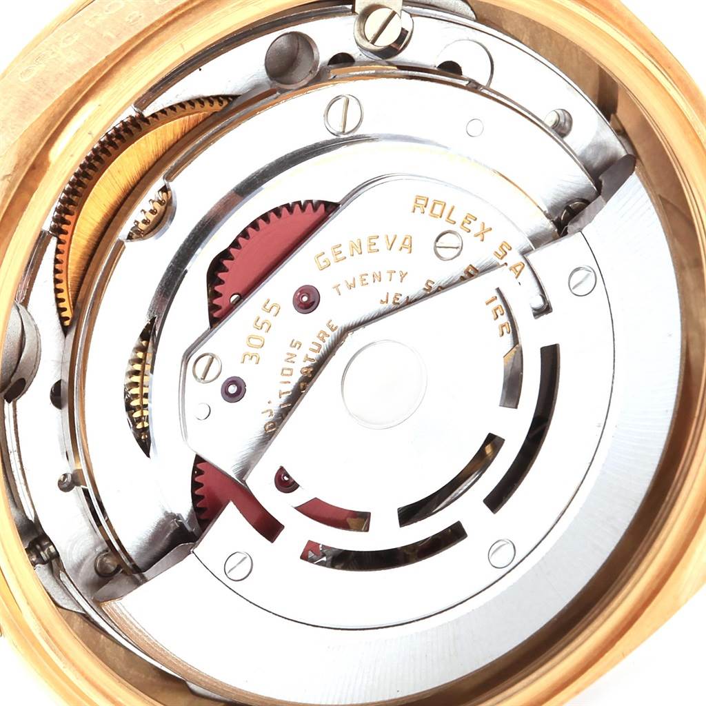 This is a close-up view of the inner mechanics and movement components of a Rolex President 18038 Men
s Yellow Gold Blue Dial 18038 Men
s Yellow Gold Blue Dial model watch.