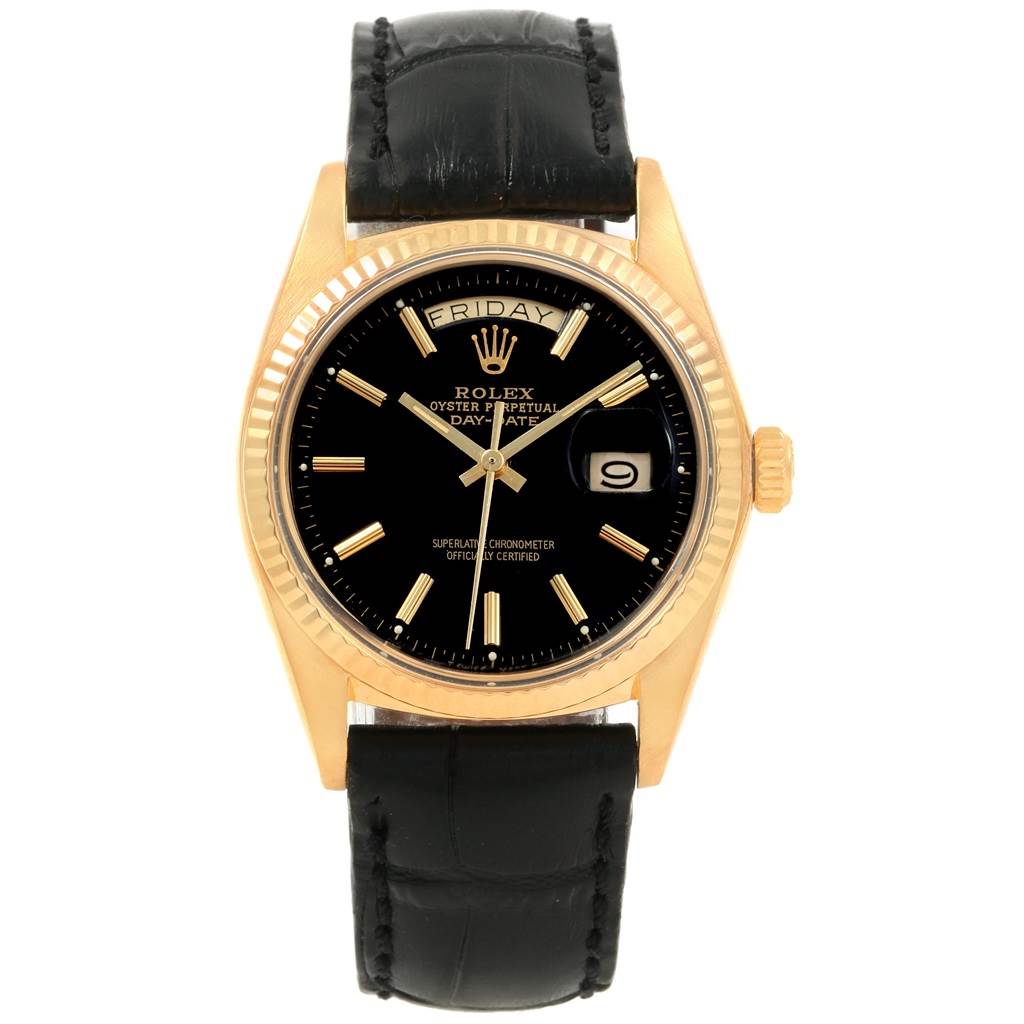 This is a front view of the Rolex President 1803 Men
s Yellow Gold Black Dial 1803 Men
s Yellow Gold Black Dial model, showing the dial, hands, day-date display, bezel, and leather strap.