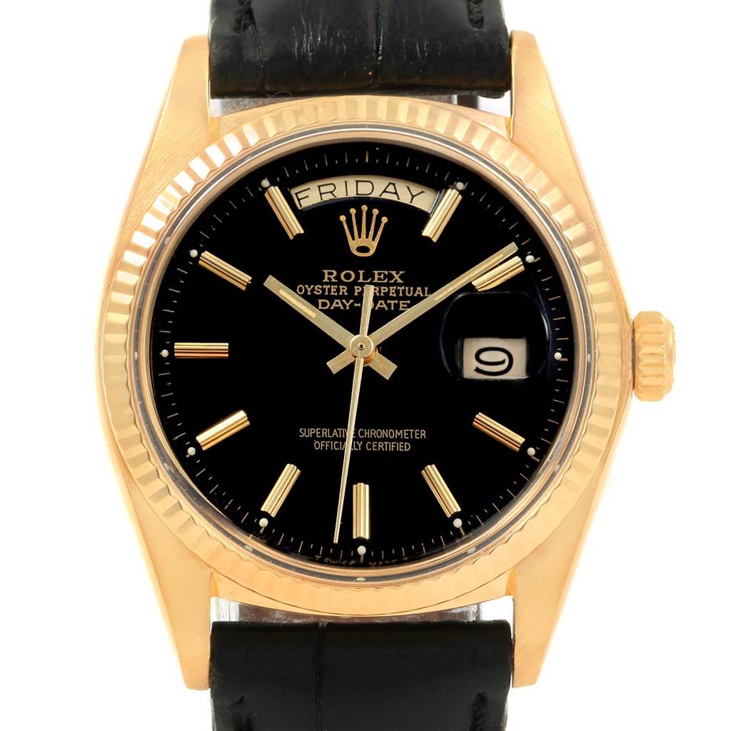 The image shows a frontal view of a Rolex President 1803 Men
s Yellow Gold Black Dial 1803 Men
s Yellow Gold Black Dial model watch with a black dial, gold indices, and a black leather strap.