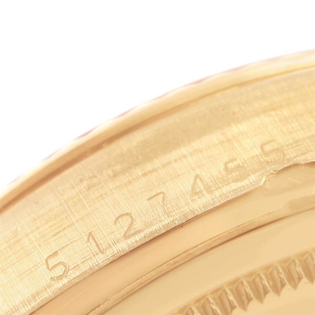 This image shows a close-up of the serial number engraving on the gold case of a Rolex President 1803 Men
s Yellow Gold Black Dial 1803 Men
s Yellow Gold Black Dial model watch.
