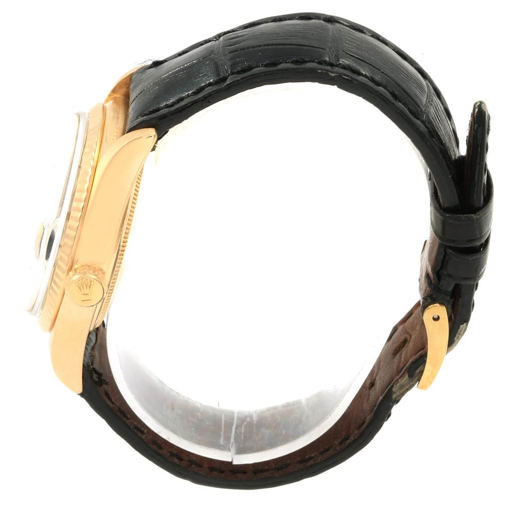 This side view of the Rolex President 1803 Men
s Yellow Gold Black Dial 1803 Men
s Yellow Gold Black Dial watch showcases the gold case, crown, and black leather strap.