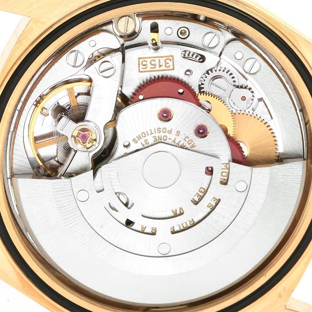 This image shows the internal movement and mechanics of the President model by Rolex from a top-down angle.