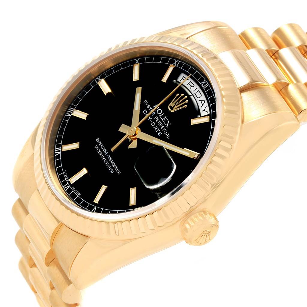 The image shows a close-up, angled view of the Rolex President 118238 Men's Yellow Gold Black Dial 118238 Men's Yellow Gold Black Dial model watch, highlighting the dial, bezel, and part of the bracelet.