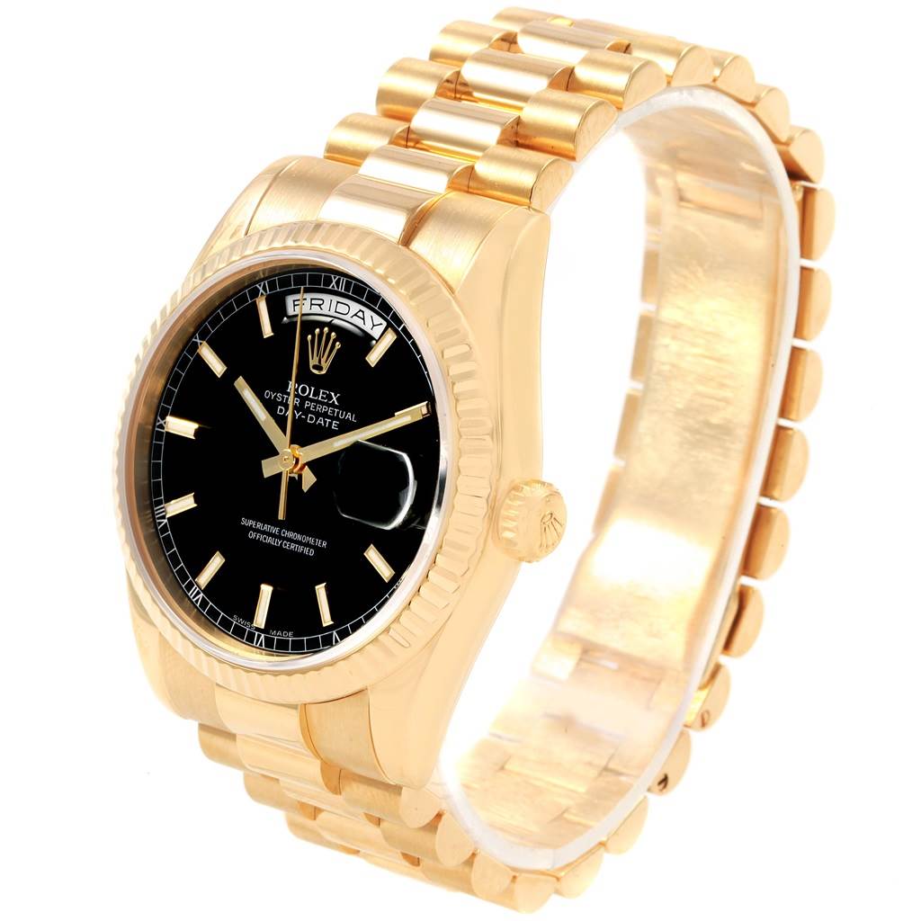 The Rolex President 118238 Men's Yellow Gold Black Dial 118238 Men's Yellow Gold Black Dial model watch is shown at an angle displaying its gold bracelet and black dial with the day and date indicators.