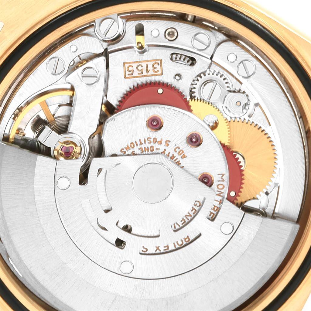 This is an internal view of a Rolex President 18238 Men
s Yellow Gold Champagne Dial 18238 Men
s Yellow Gold Champagne Dial model watch showing its movement mechanism and gears.