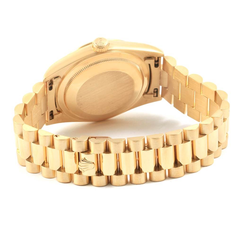 This image shows the back case, side, and bracelet of a Rolex President 18238 Men
s Yellow Gold Champagne Dial 18238 Men
s Yellow Gold Champagne Dial watch.