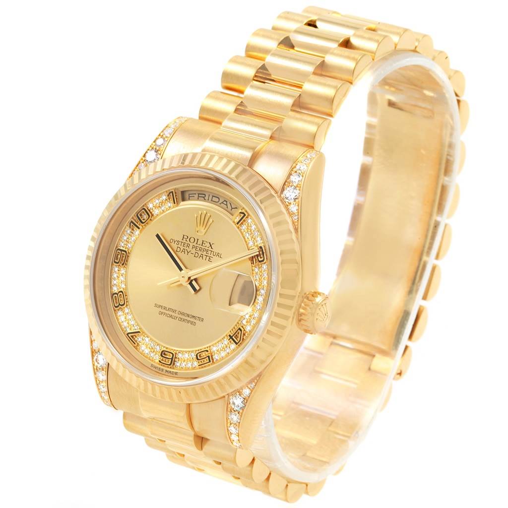 The Rolex President 118338 Men
s Yellow Gold Champagne Dial 118338 Men
s Yellow Gold Champagne Dial model watch is shown at an angle displaying its gold band, diamond-encrusted face, and dial features.