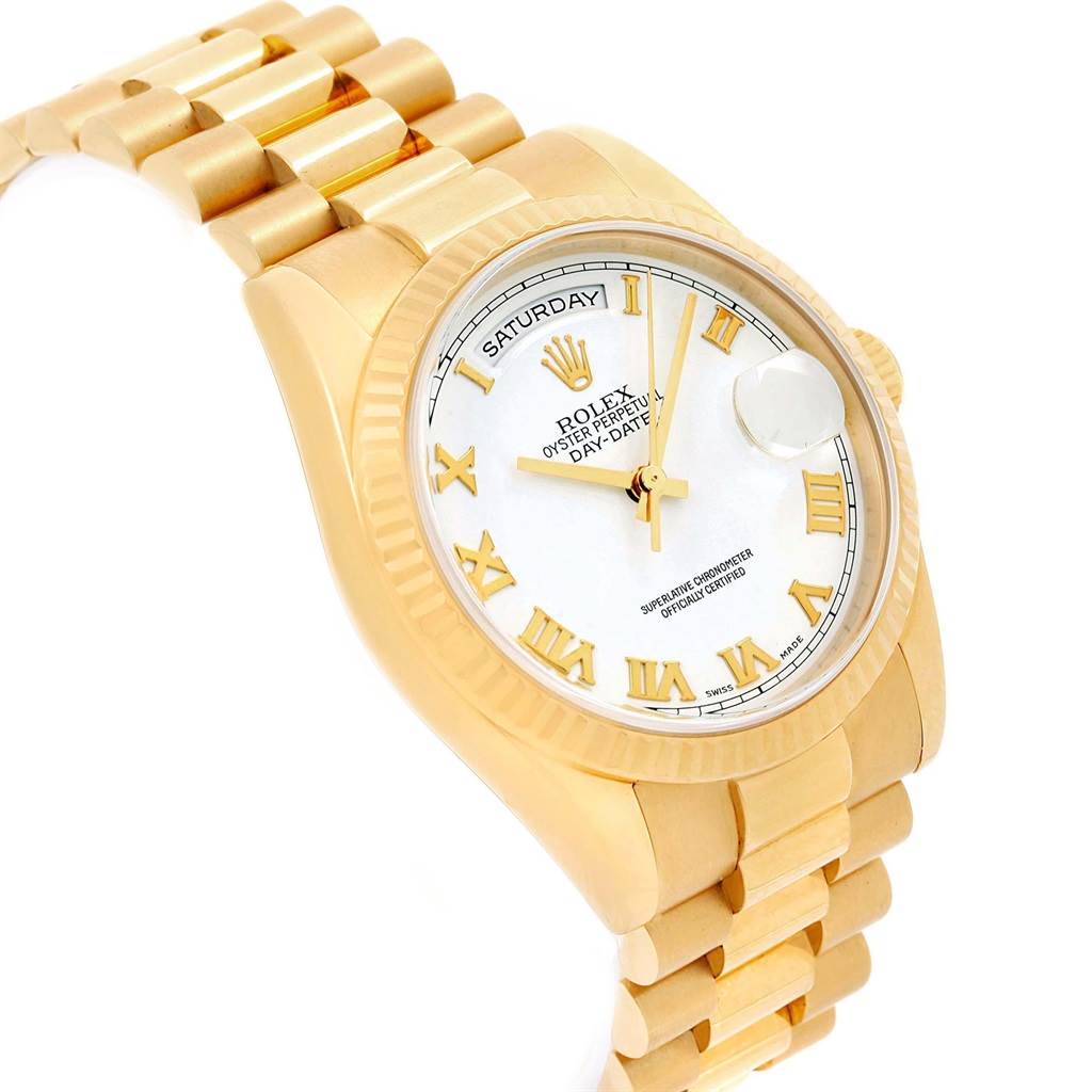 The image shows a side angle of the Rolex President 118238 Men
s Yellow Gold White Dial 118238 Men
s Yellow Gold White Dial model watch, highlighting its gold bracelet, white dial, and Roman numeral markers.