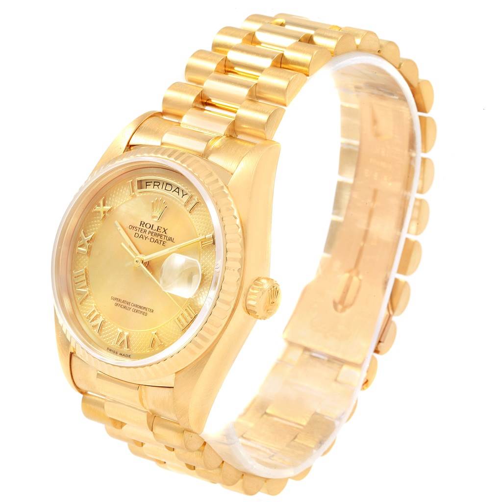 The Rolex President 18038 Men
s Yellow Gold Mother of Pearl Dial 18038 Men
s Yellow Gold Mother of Pearl Dial model watch is shown at a three-quarter angle, highlighting the gold bracelet, crown, and dial with day and date displays.