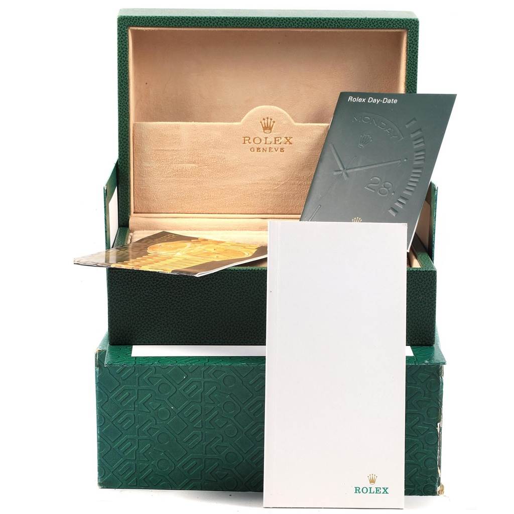 The image shows the packaging and accompanying literature for the Rolex President 18038 Men
s Yellow Gold Mother of Pearl Dial 18038 Men
s Yellow Gold Mother of Pearl Dial model watch.