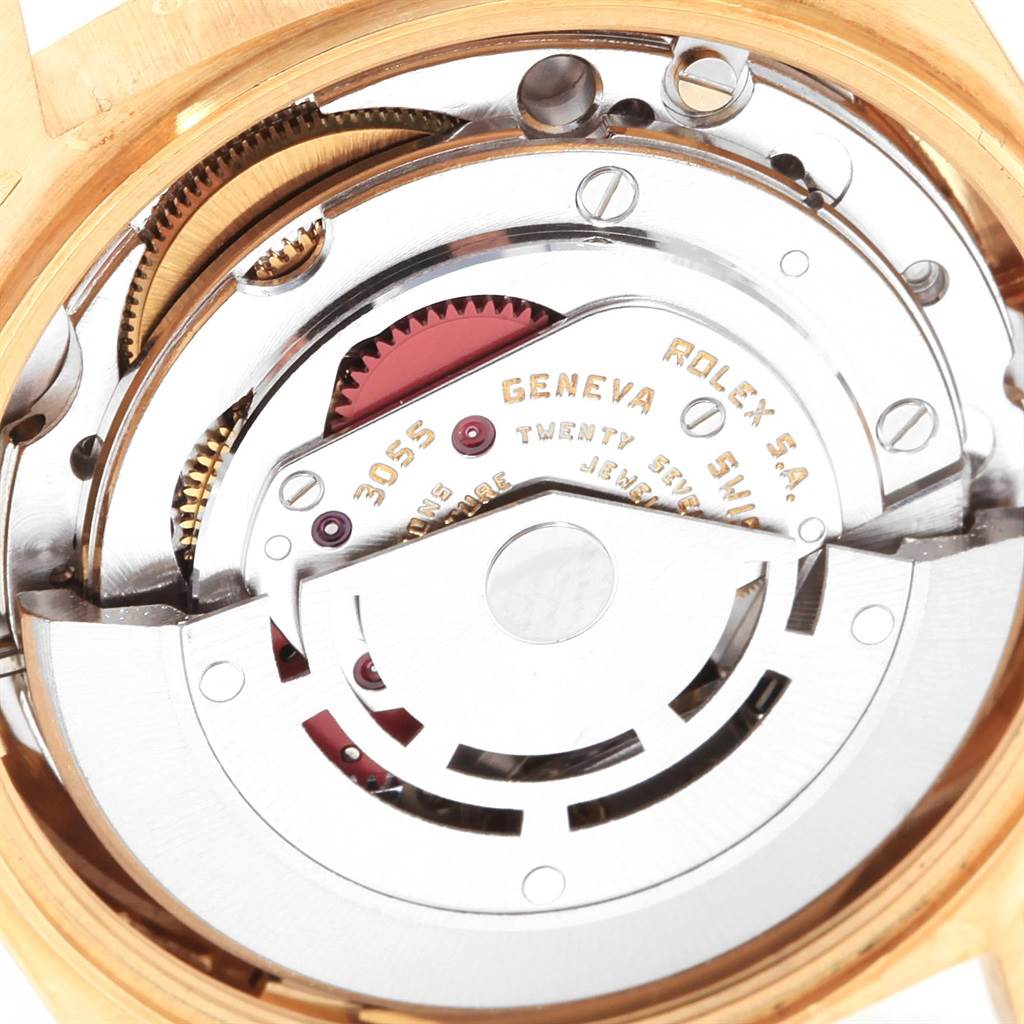 The image shows a close-up of the internal mechanism and movement parts of a Rolex President 18038 Men
s Yellow Gold Mother of Pearl Dial 18038 Men
s Yellow Gold Mother of Pearl Dial model watch.