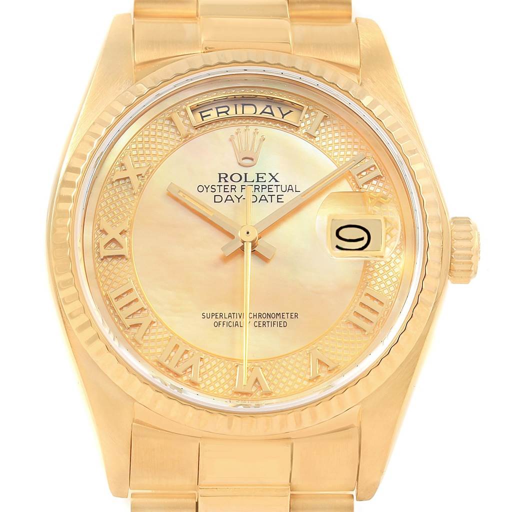 The image shows a close-up of a Rolex President 18038 Men
s Yellow Gold Mother of Pearl Dial 18038 Men
s Yellow Gold Mother of Pearl Dial model watch, highlighting the dial, hands, date window, day display, and part of the bracelet.