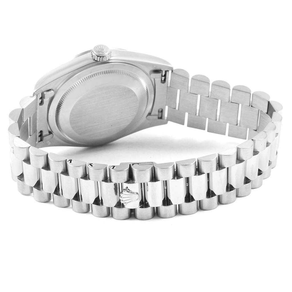 This image shows the back and bracelet of a Rolex President 18239 Men's White Gold Silver Dial 18239 Men's White Gold Silver Dial model watch, featuring its clasp and crown emblem.