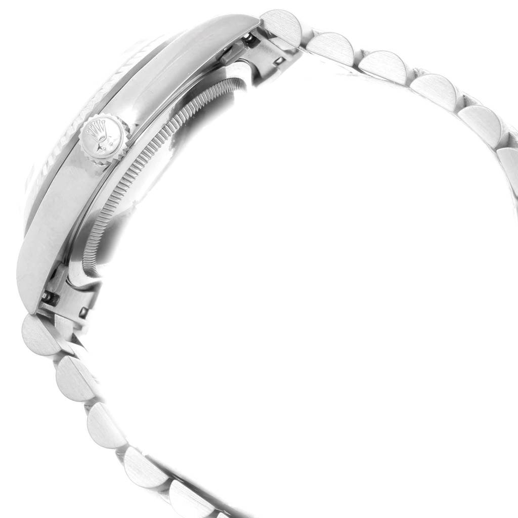 The image depicts a side view of a Rolex President 18239 Men's White Gold Silver Dial 18239 Men's White Gold Silver Dial model watch, showcasing its crown, case, and partial bracelet.