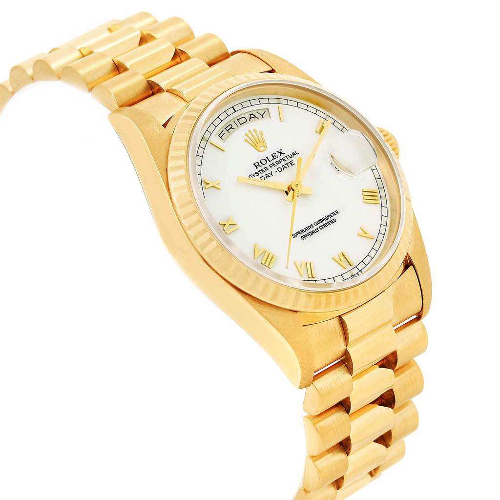 The image shows a Rolex President 18238 Men
s Yellow Gold White Dial 18238 Men
s Yellow Gold White Dial model watch from an angled side profile, highlighting the face, bezel, and part of the bracelet.