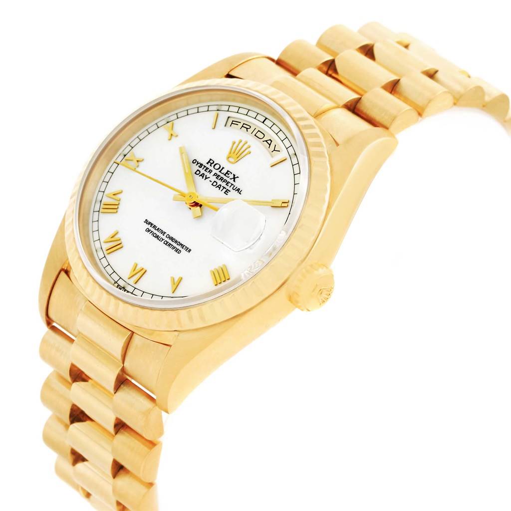 The image shows a Rolex President 18238 Men
s Yellow Gold White Dial 18238 Men
s Yellow Gold White Dial model watch angled to show the face, case, and a portion of the bracelet.