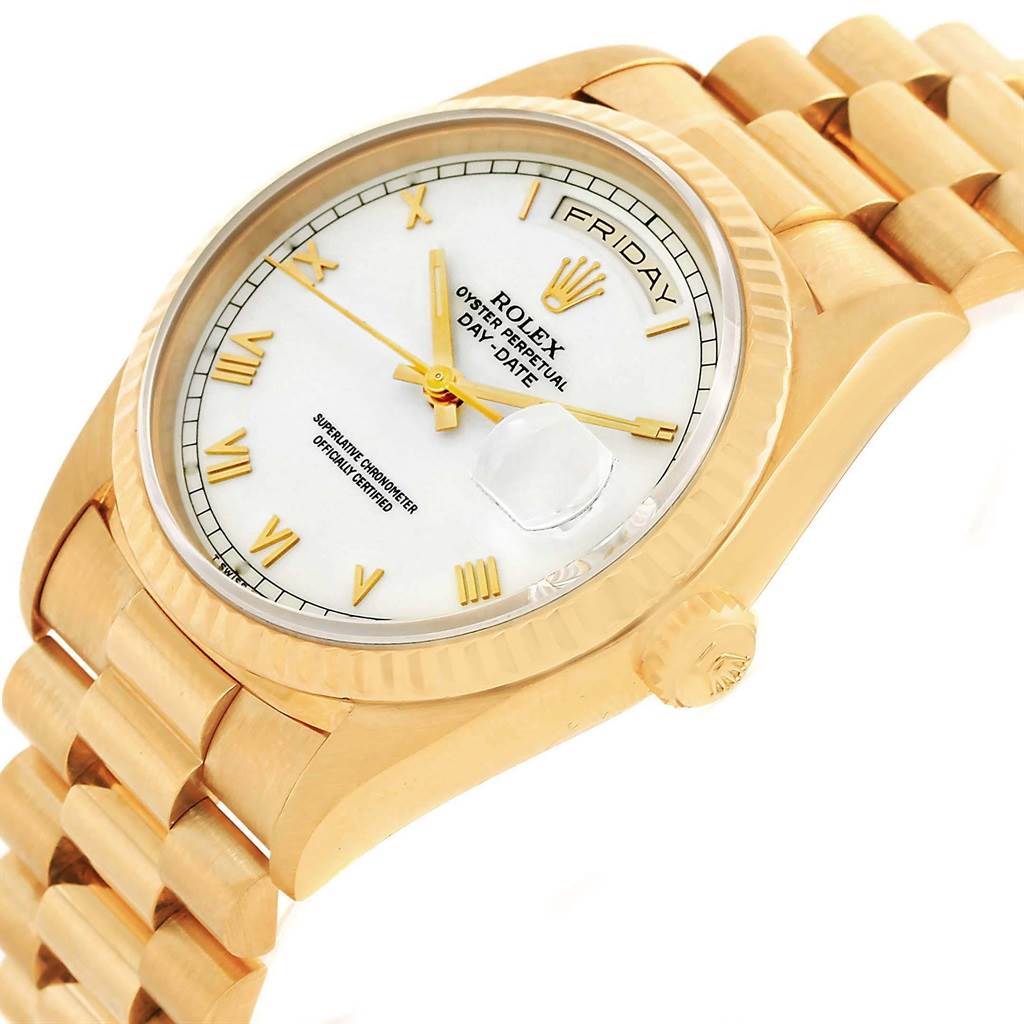 The image shows a Rolex President 18238 Men
s Yellow Gold White Dial 18238 Men
s Yellow Gold White Dial model watch at an angle, highlighting its gold case, bracelet, crown, and white dial with Roman numerals.