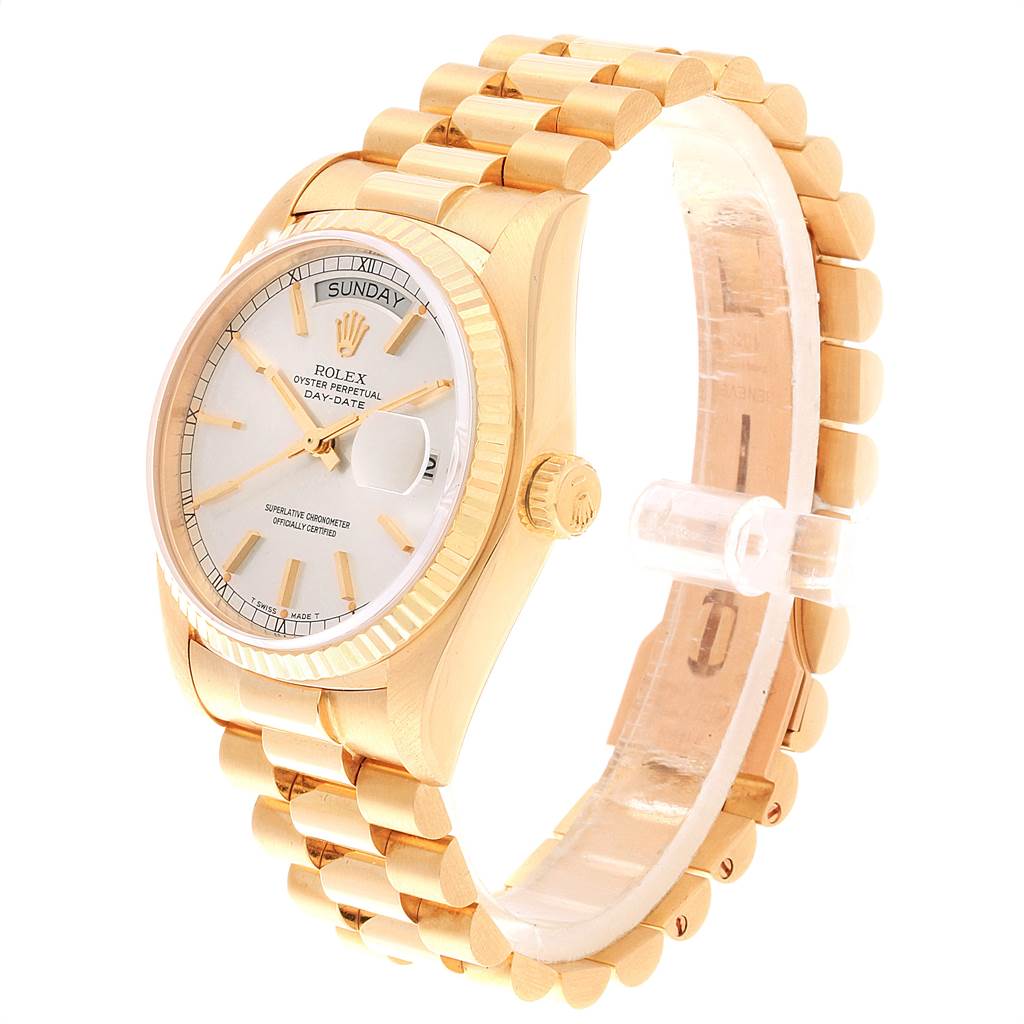 The Rolex President 18038 Men's Yellow Gold Silver Dial 18038 Men's Yellow Gold Silver Dial model watch is shown at a slight angle, displaying its face, gold bezel, case, and bracelet.