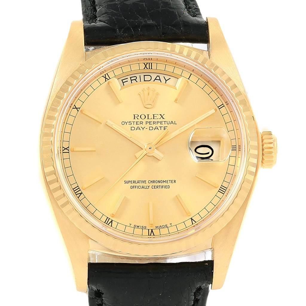 The image shows a frontal view of a Rolex President 18038 Men
s Yellow Gold Champagne Dial 18038 Men
s Yellow Gold Champagne Dial watch, highlighting the dial, hands, bezel, day and date indicators, and a black leather strap.