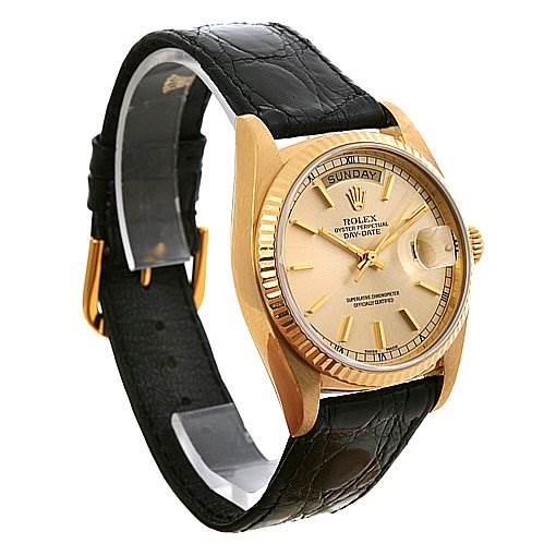 The Rolex President 18038 Men's Yellow Gold Silver Dial 18038 Men's Yellow Gold Silver Dial model watch is shown at an angle displaying the face, bezel, crown, and leather strap.