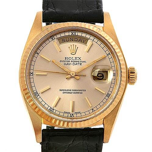 The image shows the front view of a Rolex President 18038 Men's Yellow Gold Silver Dial 18038 Men's Yellow Gold Silver Dial Day-Date watch, featuring its dial, hands, bezel, and part of the strap.