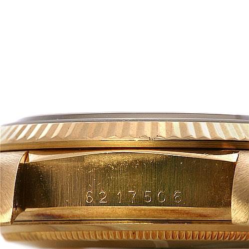 This image shows a side view of the case and bezel of a Rolex President 18038 Men's Yellow Gold Silver Dial 18038 Men's Yellow Gold Silver Dial model watch, highlighting its serial number.