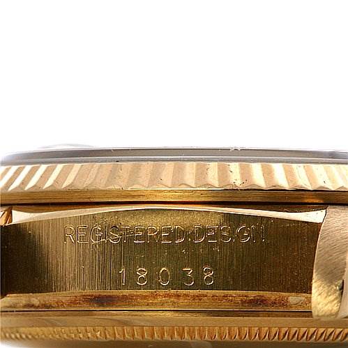 This image shows the side view of the case and bezel of a Rolex President 18038 Men's Yellow Gold Silver Dial 18038 Men's Yellow Gold Silver Dial model watch, including the engraved text "REGISTERED DESIGN" and number "18038".