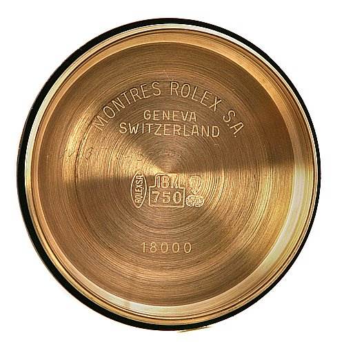 This image shows the interior case back of a Rolex President 18038 Men's Yellow Gold Silver Dial 18038 Men's Yellow Gold Silver Dial model watch, featuring brand markings and metal information.