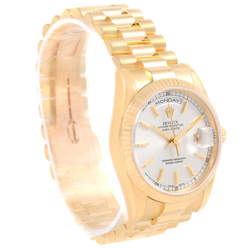 The image shows a Rolex President 118238 Men's Yellow Gold Silver Dial 118238 Men's Yellow Gold Silver Dial model watch at an angle displaying the face, bracelet, and part of the clasp.