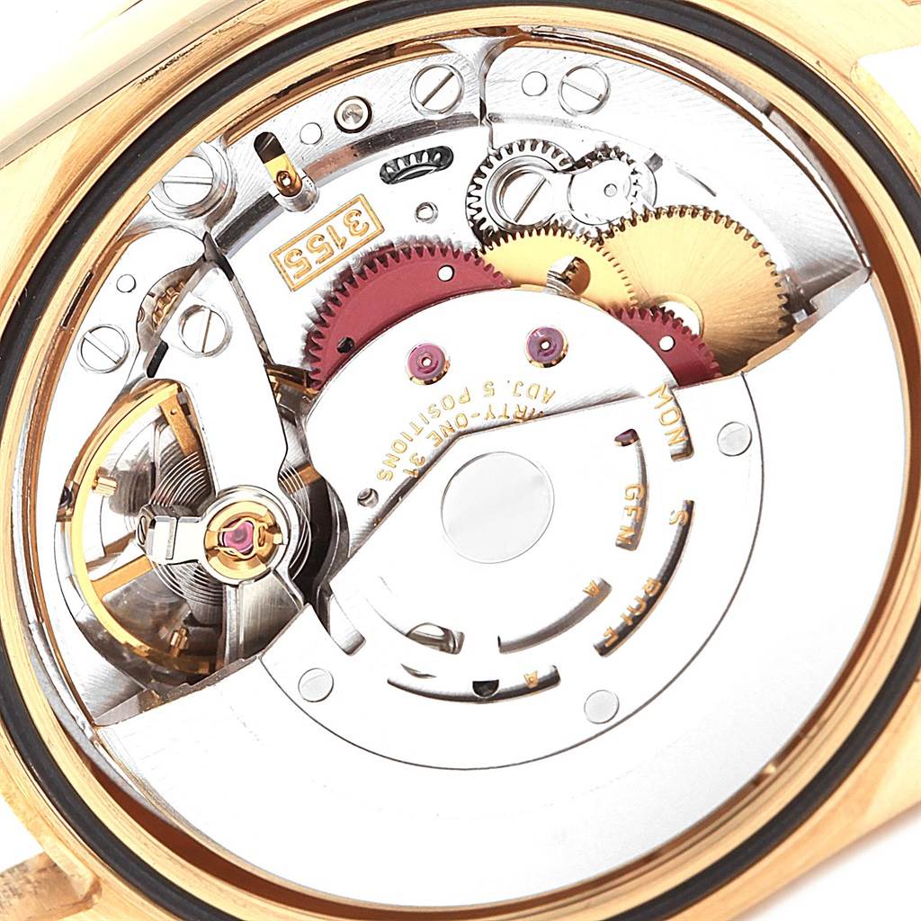The image shows the inner mechanical movement of a Rolex President 118238 Men's Yellow Gold Silver Dial 118238 Men's Yellow Gold Silver Dial model watch from a top-down angle.