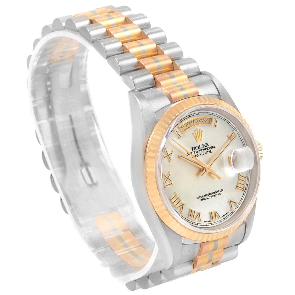 This image shows a side angle of a Rolex President 18239 Men
s White Gold Mother of Pearl Dial 18239 Men
s White Gold Mother of Pearl Dial watch, highlighting its face, bezel, and two-tone bracelet.