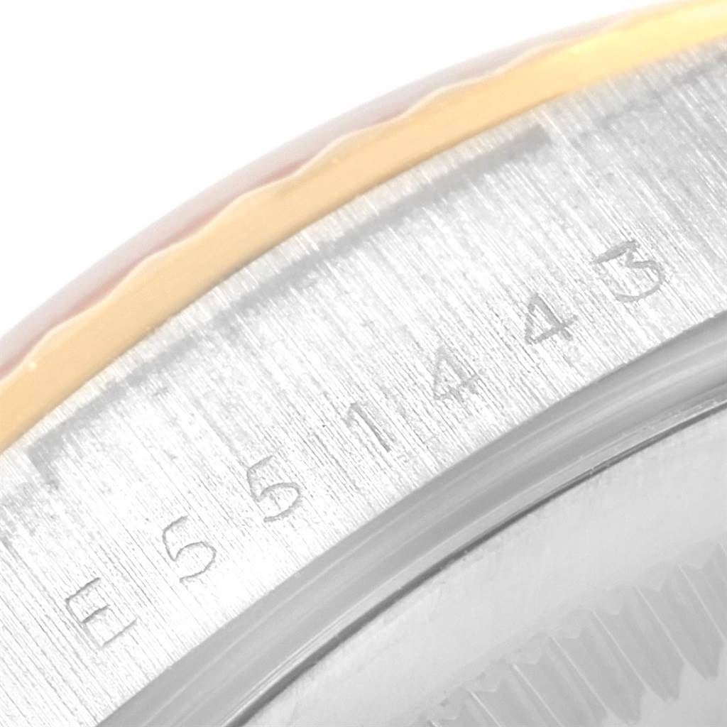 This image shows a close-up of the casing and serial number engraving on a Rolex President 18239 Men
s White Gold Mother of Pearl Dial 18239 Men
s White Gold Mother of Pearl Dial model watch.