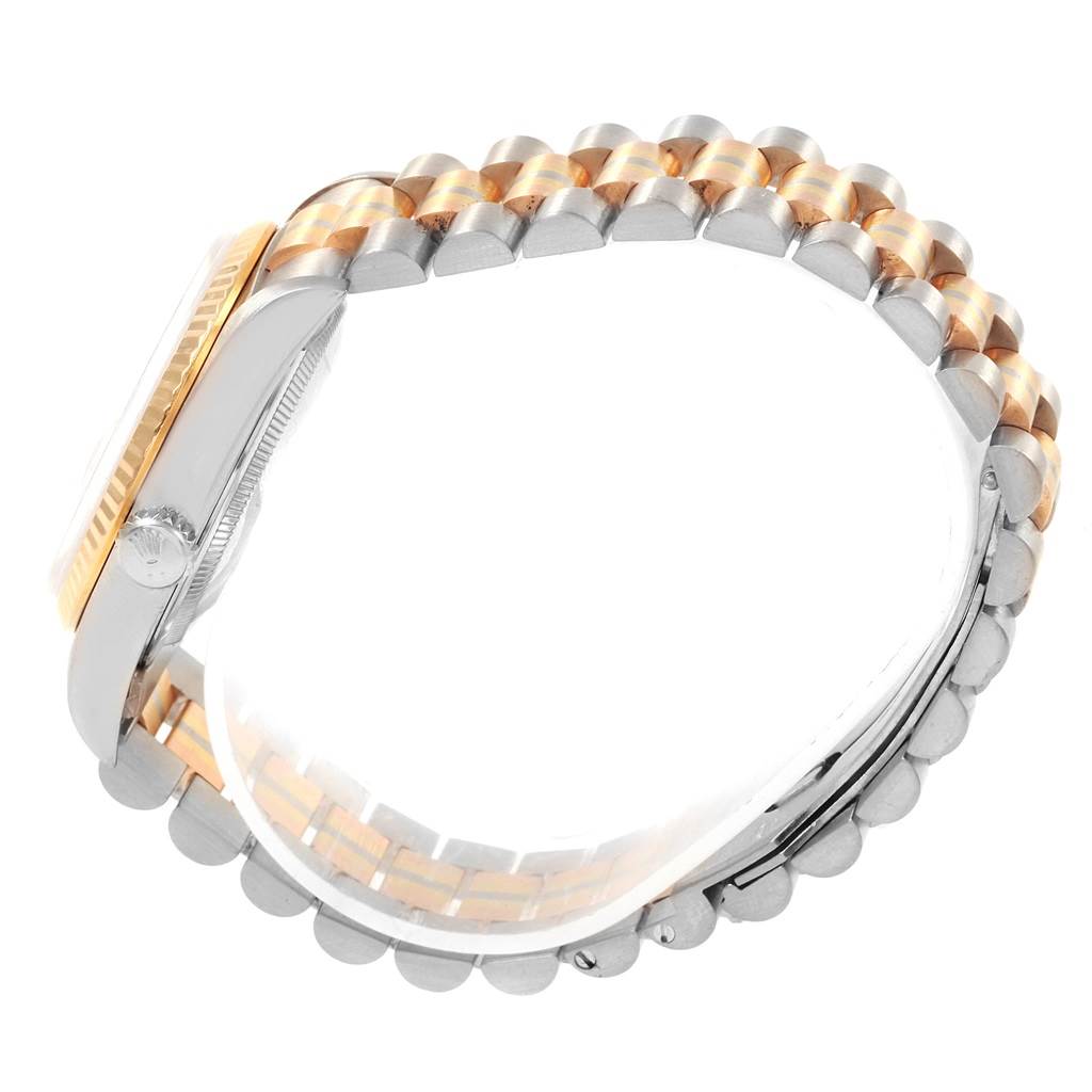 This image shows a side view of a Rolex President 18239 Men
s White Gold Mother of Pearl Dial 18239 Men
s White Gold Mother of Pearl Dial model watch, focusing on the case and the two-tone bracelet.